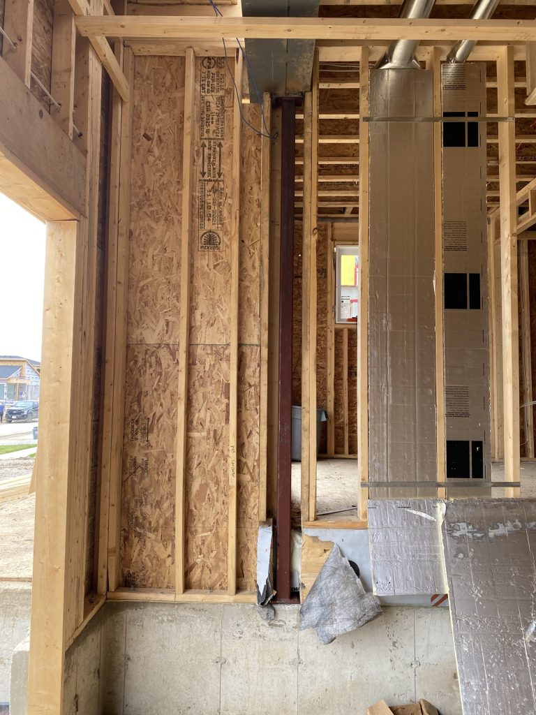 Steel post supporting I beam in the garage under construction. JW Portable Welding & Repairs 2021, London, Ontario
