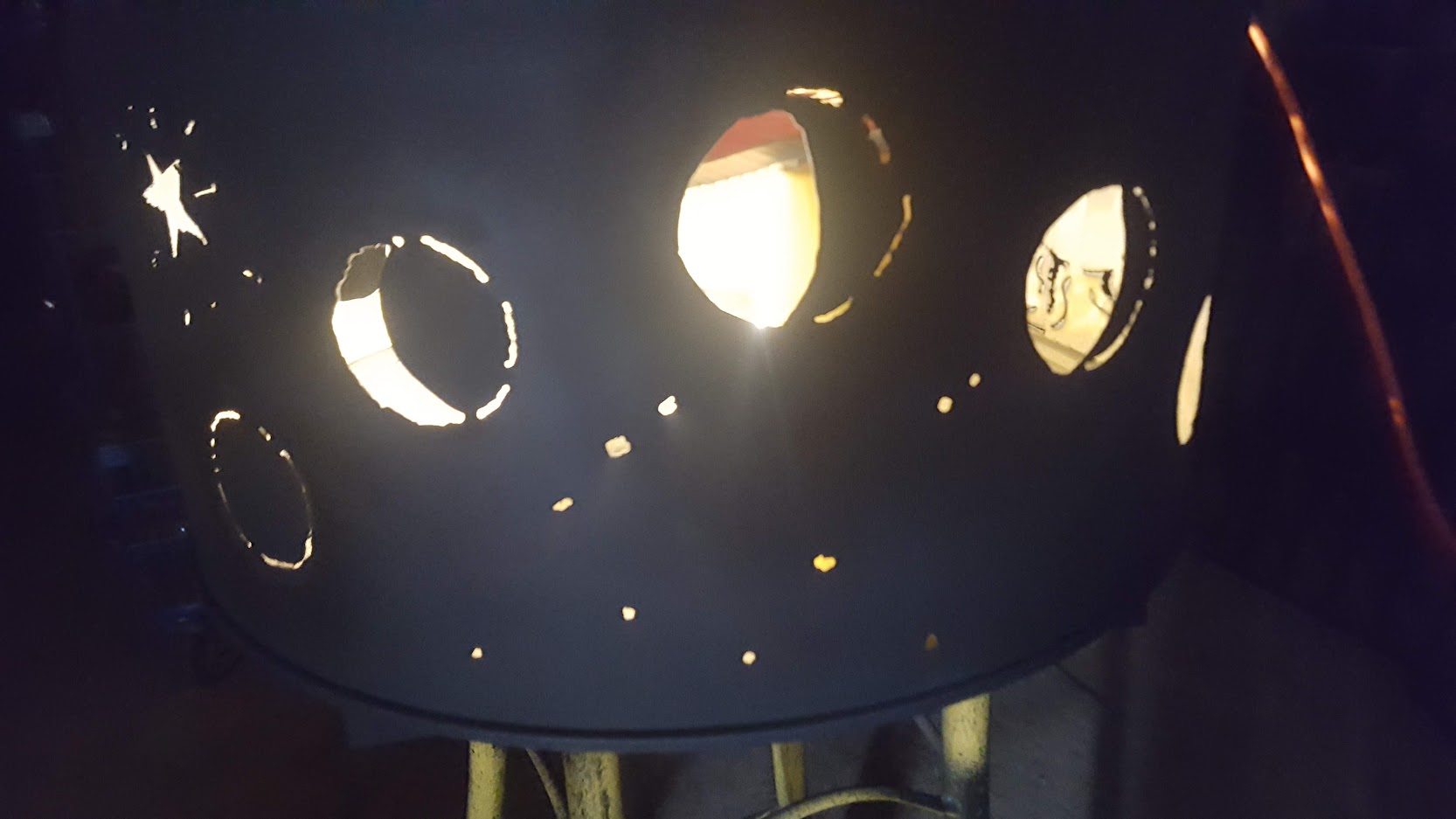 Closeup on constellation of stars plasma cut in the fire pit. JW Portable Welding & Repairs 2020 London, Ontario