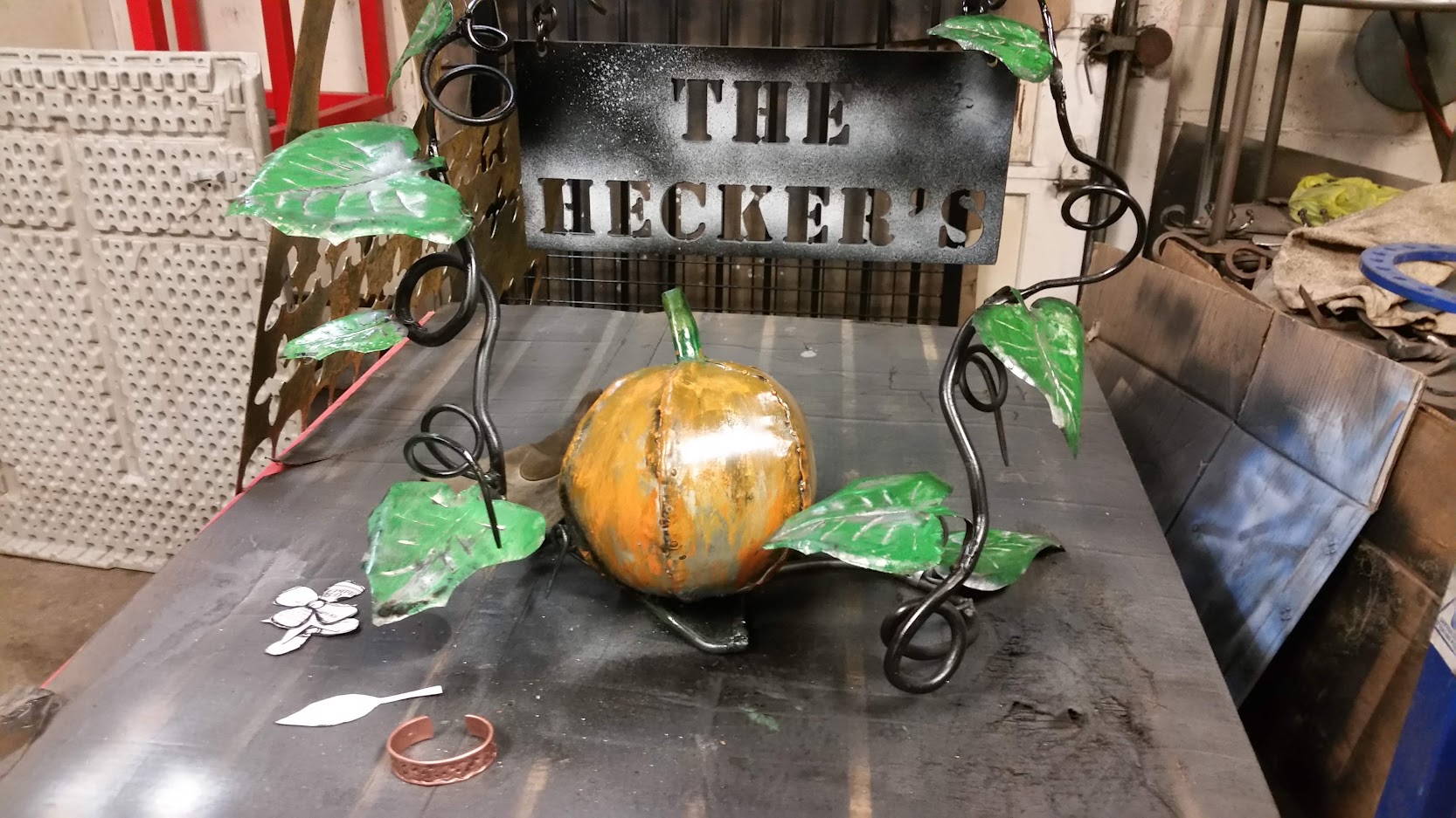 Family name sign, large, with full size pumpkin in metal for Halloween. JW Portable Welding & Repairs 2020, London, Ontario