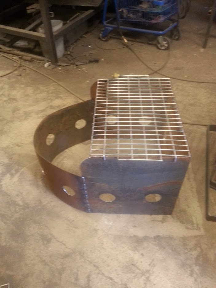 Portable fire pit grill that can be placed on the ground. JW Portable Welding & Repairs 2019 London Ontario