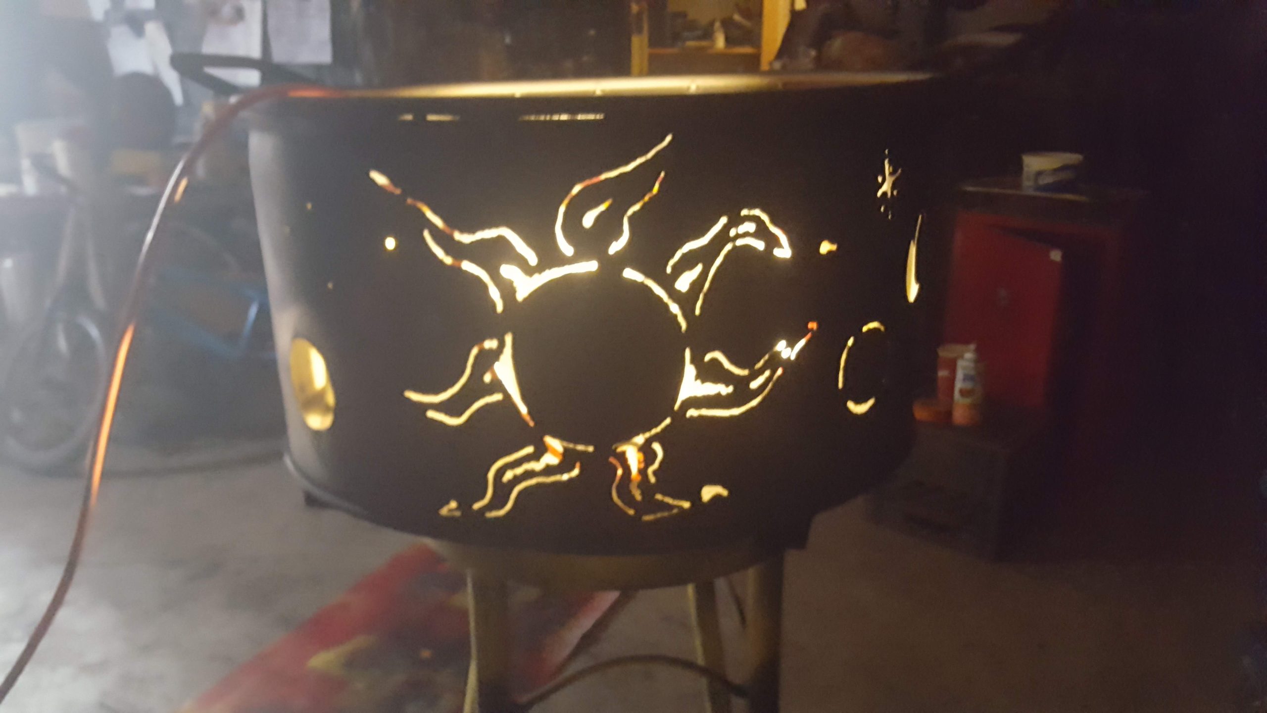 Wood burning fire pit with laser cut Sun motive. JW Portable Welding & Repairs 2020, London, Ontario