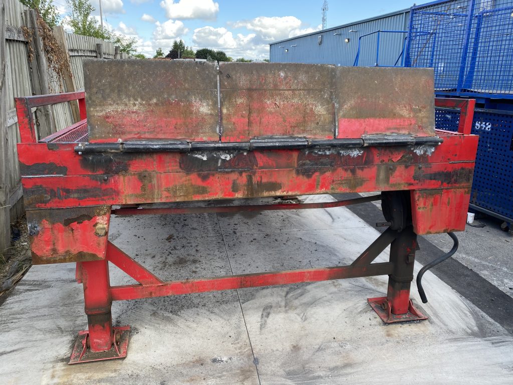 All three sections of the lip are welded to the stronger hinge and are lifted up. In this way we check proper position of the flopper and easy lifting. JW Portable Welding, London, Ontario, 2022