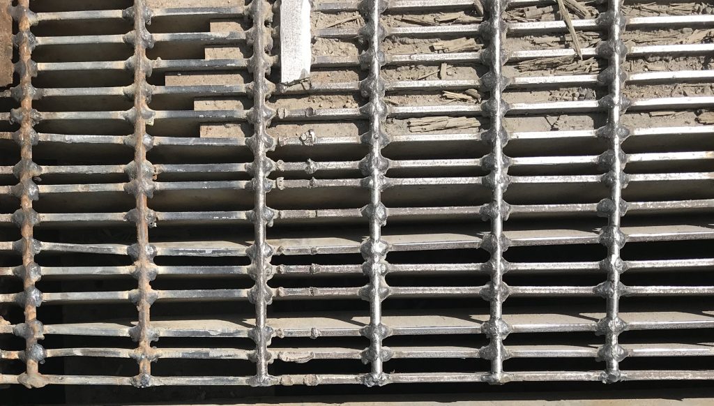 We have fitted and welded a new steel rod in places where it was missing to stabilize blades of grating. In this way we preserve grating structural integrity. JW Portable Welding, London, Ontario, 2021