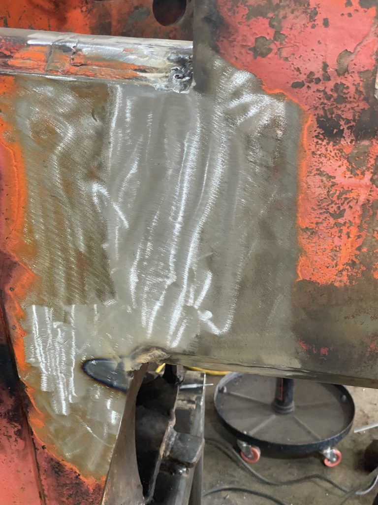 The repair welds on crack 1 and 2 has been grinded off flash and the spot is ready for in house MPT testing. The large area of bear metal has been exposed. August 11, 2025 for JW Portable Welding & Repairs, Lucan Ontario.