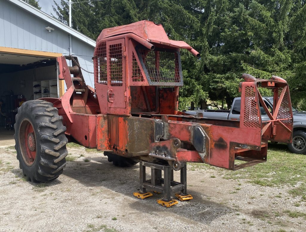 The repaired Timberjack skidder is ready for pickup. The walking beam is installed and it has new bushings and new pins. The skidder stands on the dolly and the front axle will be attached by the owner later on. August 20, 2025, for JW Portable Welding & Repairs, Lucan Ontario.