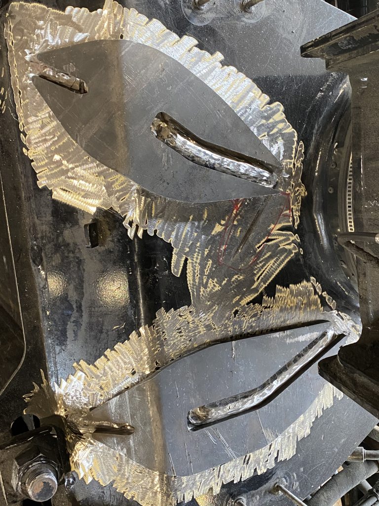 These two fishplates really look like fish made from steel. Each fishplate has wo slots due to its large size for better attachment to the base metal. JW Portable Welding & Repairs, June 21 2021, London Ontario