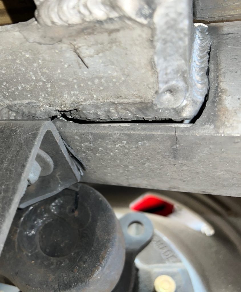 This is a material frame crack on a single axle aluminum trailer. Please note the solid aluminum weld that has not cracked. Additionally, there is an impact damage close to the steel angle and a small crack under the frame. JW Portable Welding & Repair , November 8 , 2025