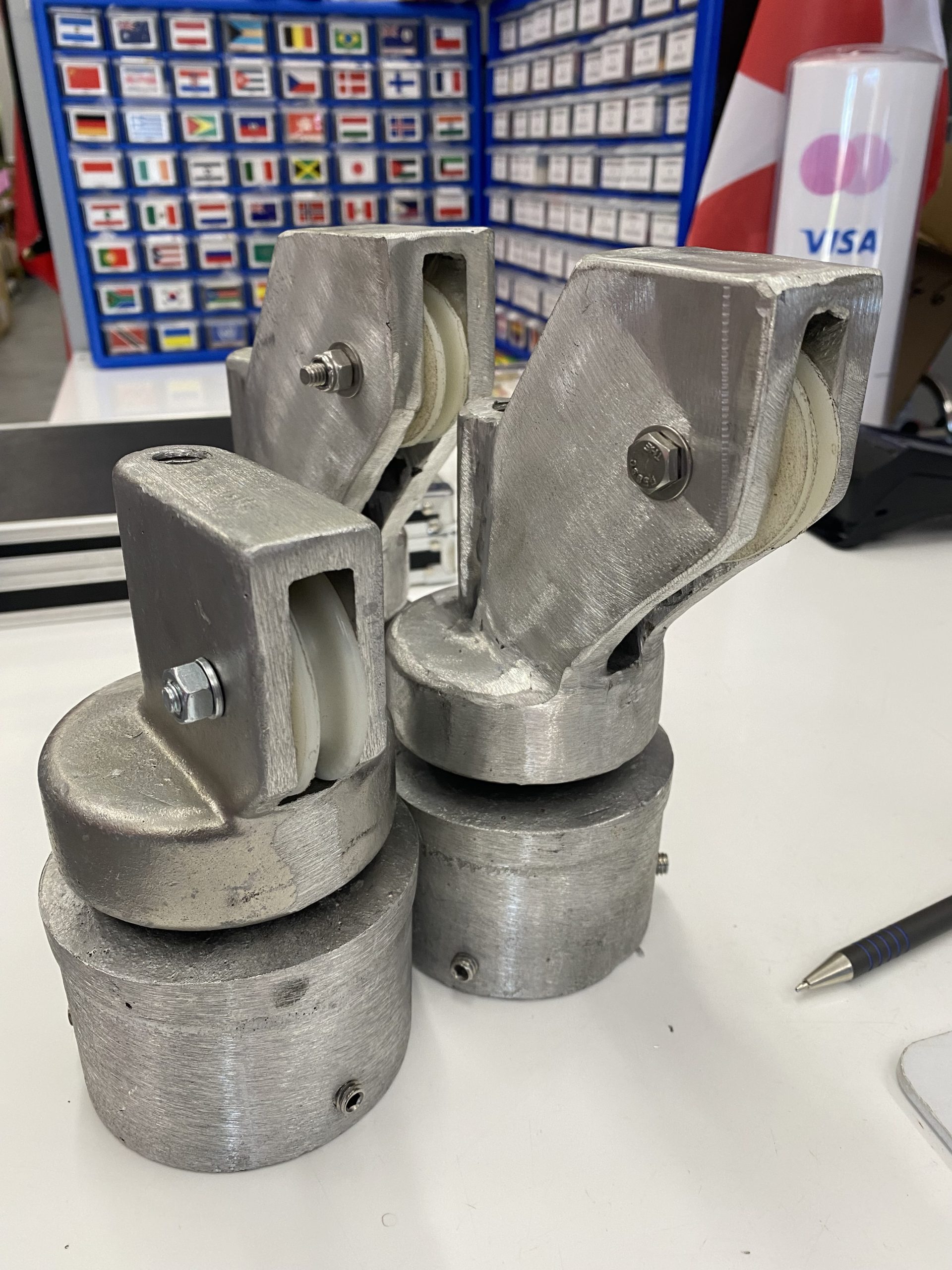 Aluminum fabrication of flagpole tips that contain bearings and shaft with sheve. Our 2 aluminum fabricated flagpole tips are much larger and increased the operational radius by 1.75 inch, maintained the original flagpole line feeding angle, and we did not damaged the original bearing of the tip. For JW Portable Welding , 2025, Shop in Lucan, Ontario