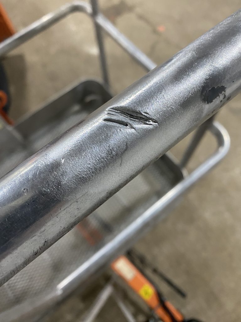 Damaged surface of aluminum handrail of Home Depot's lifter. We will surface weld this but other sections must be cut out and then fabricated. For JW Portable Welding, 2025, Shop in Lucan, Ontario