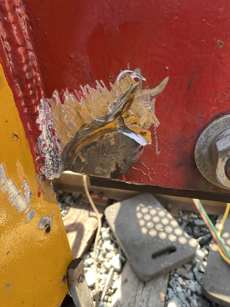 Since the bumper plate is 1 inch thick we had to weld the crack from inside under the locomotive and from outside in standing position. Here is the grooving outside of the same crack. Please notice the bore edges. London ON, 2024, JW Portable Welding & Repairs.