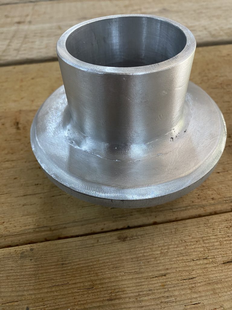 Fabricated plug instead of removable cap. The edges of plug are beveled for half V weld in top on top of the pole in order to maintain the coating of the pole. For JW Portable Welding, 2025, Shop in Lucan, Ontario