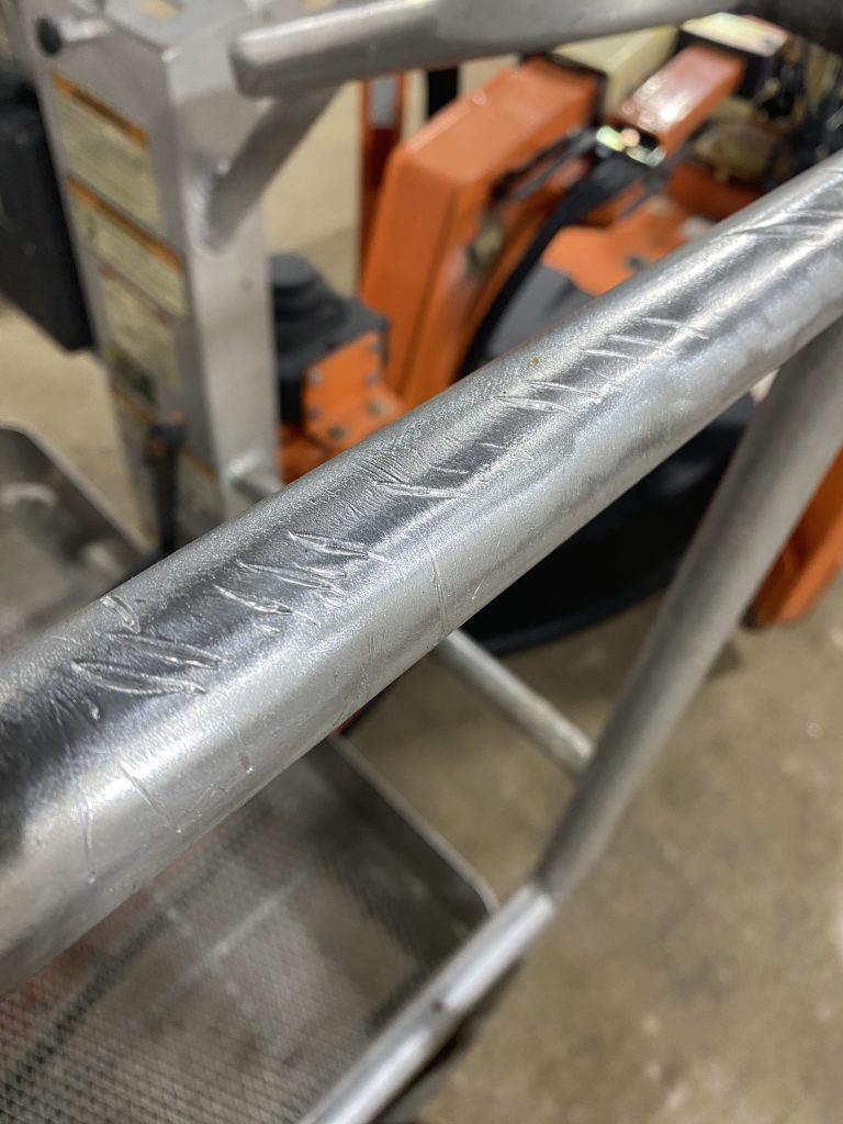 Large section of damaged aluminum handrail of Home Depot's lifter with multiple cuts that will be repaired with surface aluminum weld and then polished up. For JW Portable Welding, 2025, Shop in Lucan, Ontario