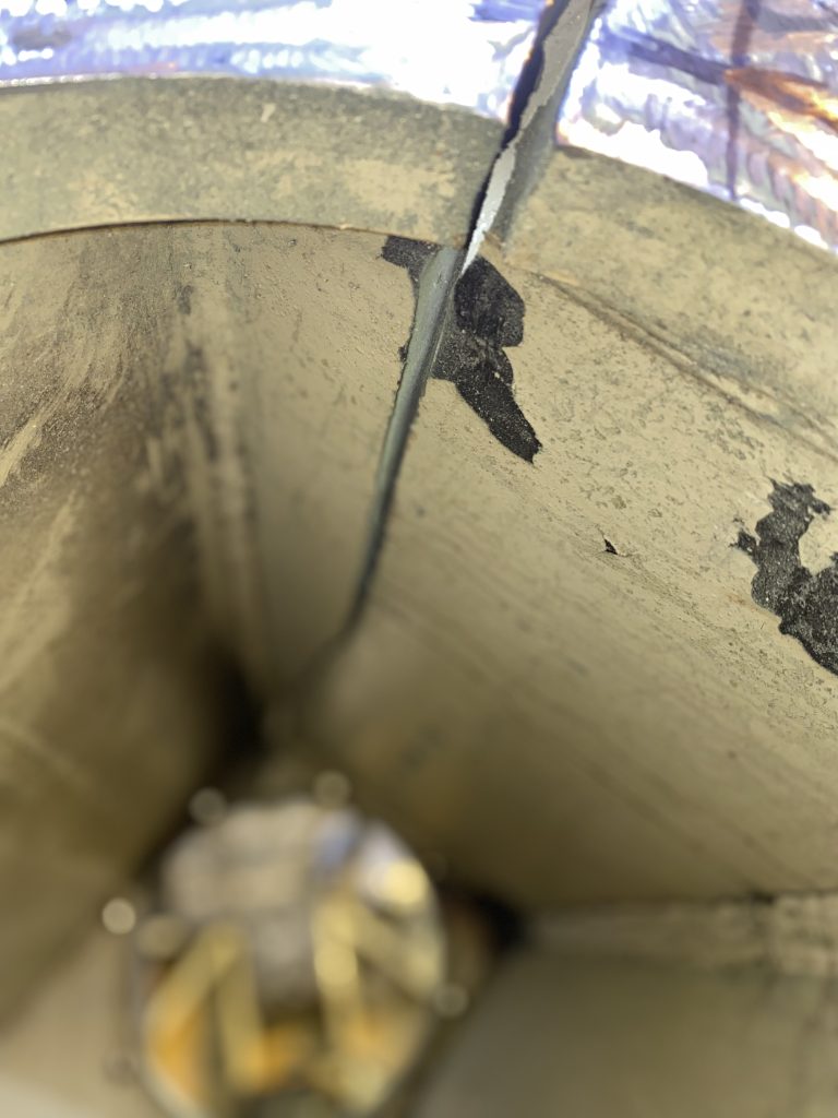 Inspecting of crack in heavy industrial equipment. This type of inspection develops ideas how to weld this long crack in the 1.5" steel wall. For JW Portable Welding, 2024, Brampton, Ontario