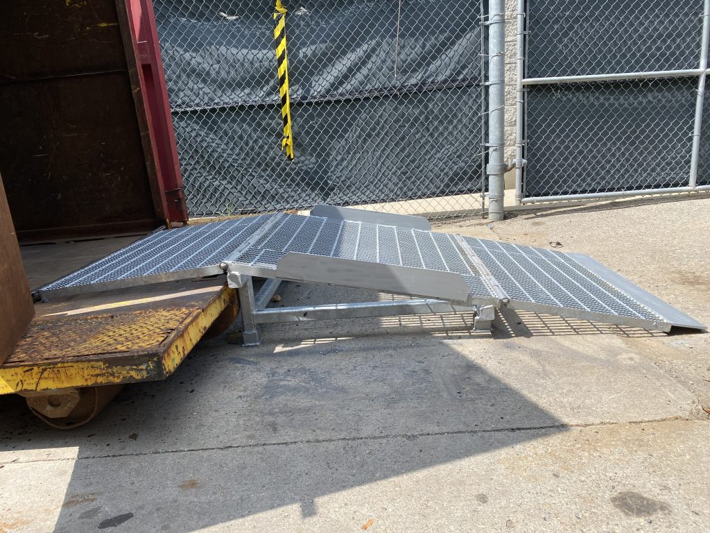 Foldable and removable ramp allows for movement of 800lbs load on top of 30 inch elevation. Designed by JW Investrade Inc. and fabricated by JW Portable Welding & Repairs, London, 2024