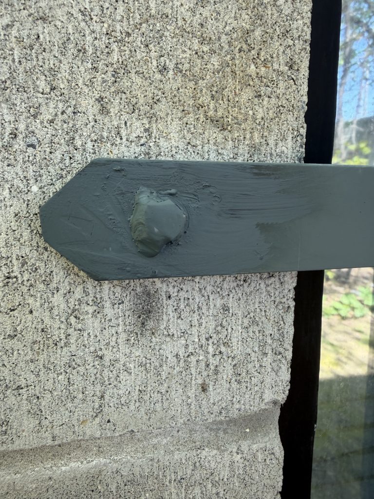 Welded lug bolt to the grill structure makes cutting difficult and protects the lug removal. Metal fabrication by JW Portable Welding & Repairs, 2026, London