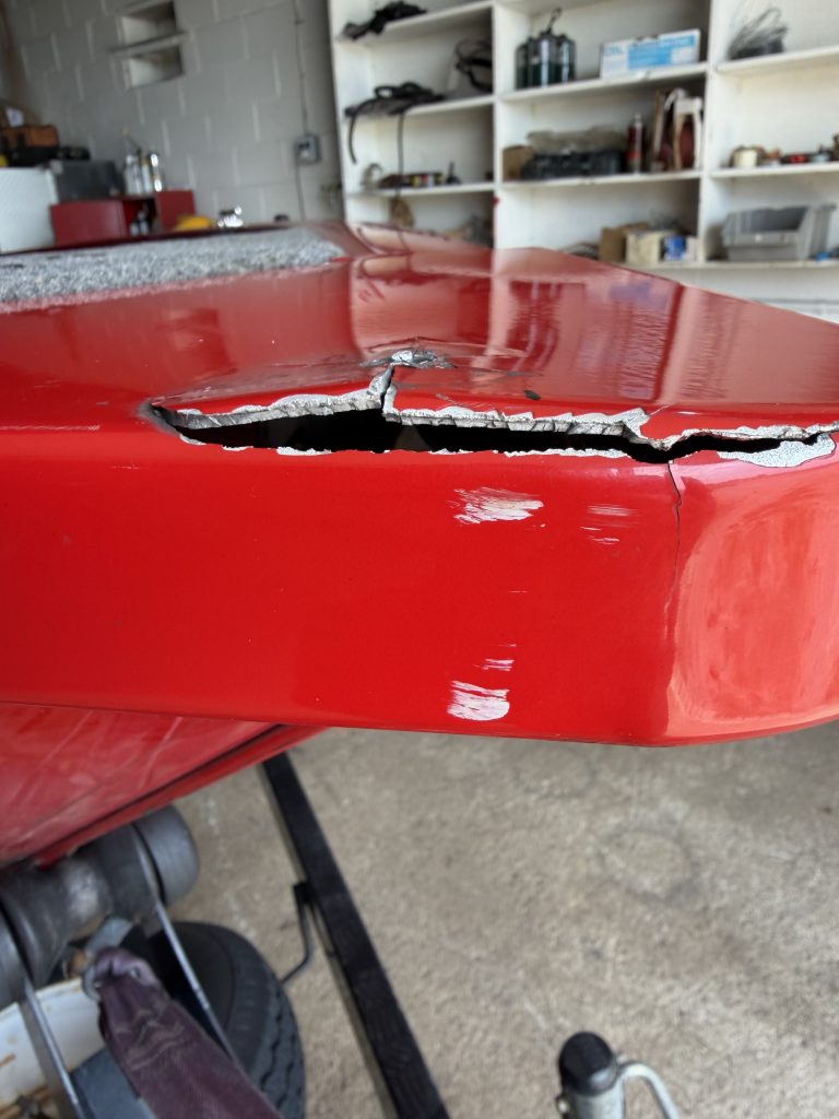 6 inches bow crack in place of trolling motor mount due to lack of stabilizers and excessive fatigue vibration. This aluminum boat repair by welding will include the modification to strengthen the attachment. Please notice the smaller horizontal and vertical cracks in thin aluminum bow. The owner does not use stabilizers during the transportation and sailing. For JW Portable Welding & Repair, Lucan, 2026