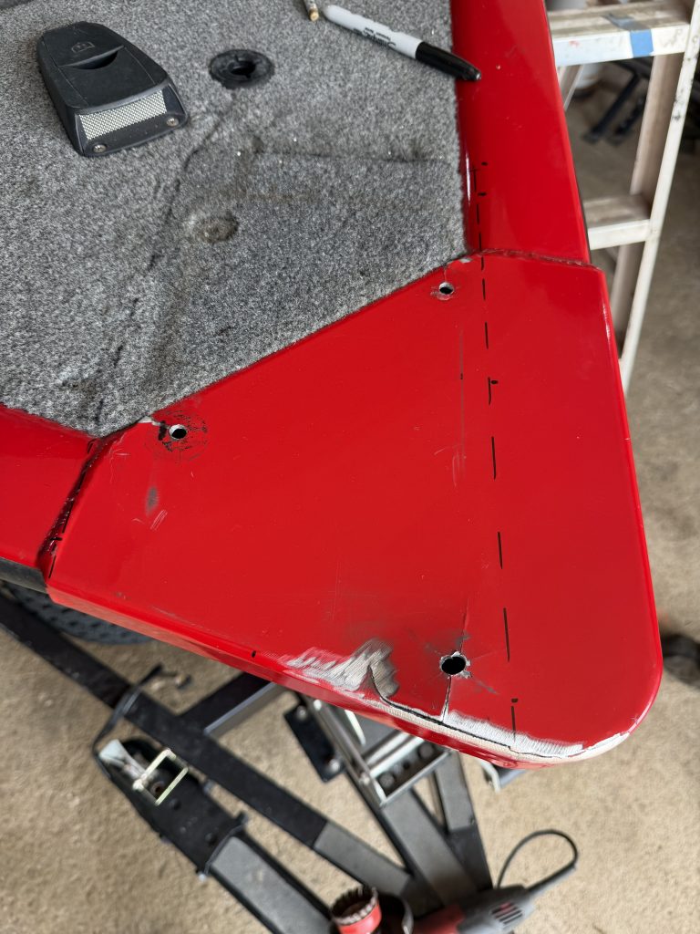 We are planning to place the 3/16 thick aluminum plate in the spot marked to provide uniform and flat support to mount the trolling motor. Notice the forth hole in the wooden deck covered by fuzzy fabric that is out of plane in comparison to other 3 holes. The repair will consist of welding this plate to the bow in locations that are the structurally the strongest. For JW Portable Welding & Repair, Lucan, 2026