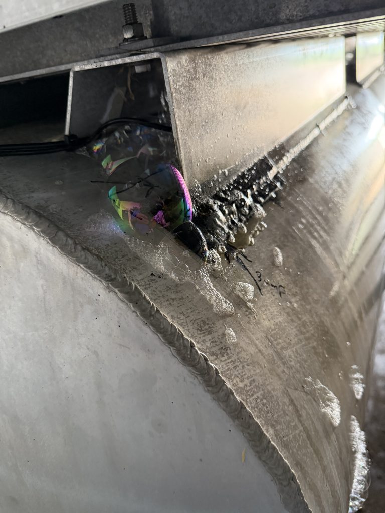 Air bubbles on the the pontoon during pressure testing signalize location of holes in the pontoon. majority of holes in pontoons happen on the brackets welded to the aluminum pontoon. For JW Portable Welding, Lucan, 2026